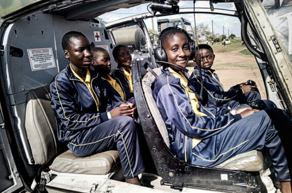 Kuwala students inside helicopter